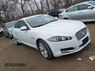2015 Jaguar XF V6 Portfolio with VIN SAJWJ0FF2F8U59934, listed as a IAAI auction lot 41558305 with 120,219 mi miles. Bid and sale history available at carsss.com. Image 1.