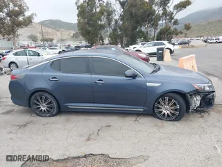 2014 Kia Optima Hybrid LX with VIN KNAGM4AD4E5066067, listed as a IAAI auction lot 41884259 with 131,077 mi miles. Bid and sale history available at carsss.com. Image 13.