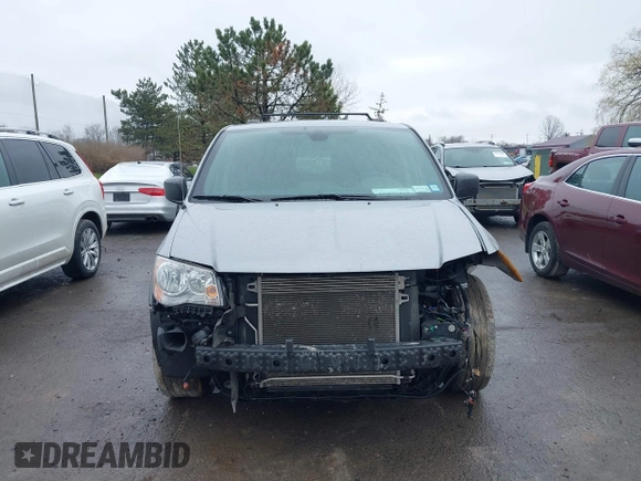 2019 Dodge Grand Caravan SXT with VIN 2C4RDGCG1KR580039, listed as a IAAI auction lot 41997472 with 163,915 mi miles and . Bid and sale history available at DreamBid. Image 13.