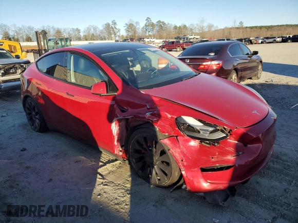 2022 Tesla Model Y Performance with VIN 7SAYGDEF2NF323142, listed as a Copart auction lot 48218235 with 43,524 mi miles and Salvage Title. Bid and sale history available at DreamBid. Image 4.