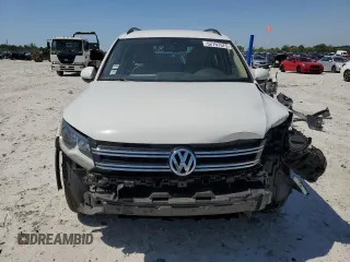 2017 Volkswagen Tiguan S z VIN WVGAV7AXXHK028345, wystawiony jako Copart lot #52797575 z przebiegiem 67 364 mil mil oraz Szkody całkowita. Historia ofert i sprzedaży dostępna na DreamBid. Obrazek 5.