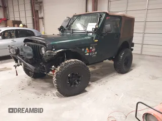 2000 Jeep Wrangler Sahara with VIN 1J4FA59S4YP788741, listed as a IAAI auction lot 41427876 with 209,434 mi miles. Bid and sale history available at carsss.com. Image 2.