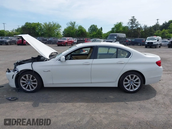 2013 BMW 5 Series 528i xDrive with VIN WBAXH5C54DD107317, listed as a IAAI auction lot 42244446 with 47,858 mi miles and . Bid and sale history available at DreamBid. Image 14.