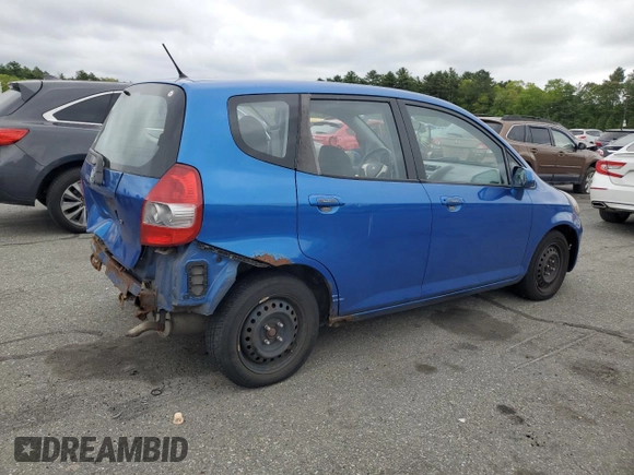 2007 Honda Fit with VIN JHMGD38497S020207, listed as a Copart auction lot 57447875 with 185,603 mi miles and Salvage title. Bid and sale history available at DreamBid. Image 3.