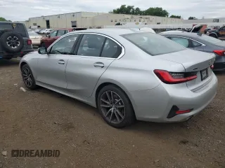 2021 BMW 3 Series 330i xDrive with VIN WBA5R7C0XMFK36218, listed as a Copart auction lot 62274005 with 47,467 mi miles and Salvage title. Bid and sale history available at DreamBid. Image 2.