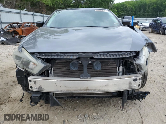 2016 Nissan Maxima SL with VIN 1N4AA6AP0GC379967, listed as a Copart auction lot 60839615 with 107,201 mi miles and Salvage title. Bid and sale history available at DreamBid. Image 5.