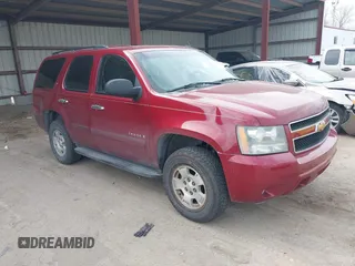 2007 Chevrolet Tahoe LTZ z VIN 1GNFK130X7J313106, wystawiony jako IAAI lot #42042891 z przebiegiem 199 763 mil mil oraz . Historia ofert i sprzedaży dostępna na DreamBid. Obrazek 1.