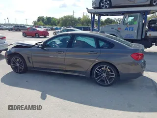 2018 BMW 4 Series 440i with VIN WBA4J5C54JBF07315, listed as a IAAI auction lot 41738540 with 74,577 mi miles and . Bid and sale history available at DreamBid. Image 14.