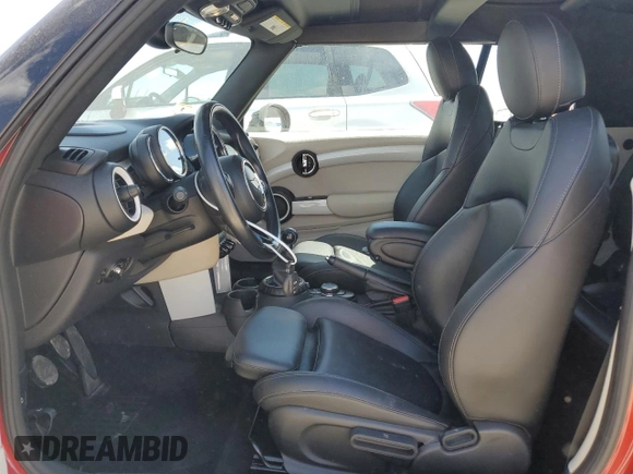 2016 MINI Convertible S with VIN WMWWG9C51G3A92388, listed as a Copart auction lot 43527125 with 144,454 mi miles and Salvage Title. Bid and sale history available at DreamBid. Image 7.