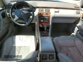 2000 Mercedes-Benz E-Class with VIN WDBJF65J1YB151080, listed as a Copart auction lot 54421955 with 392,612 mi miles and Salvage Title. Bid and sale history available at carsss.com. Image 8.