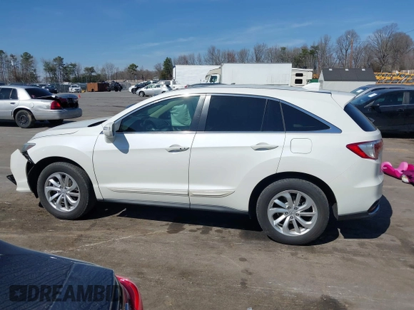 2016 Acura RDX Technology with VIN 5J8TB4H54GL009695, listed as a IAAI auction lot 41784860 with 115,184 mi miles and . Bid and sale history available at DreamBid. Image 14.