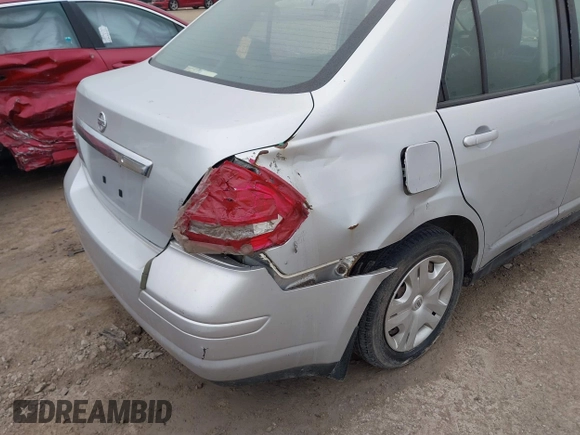 2010 Nissan Versa S with VIN 3N1BC1AP9AL404584, listed as a IAAI auction lot 42367293 with 158,377 mi miles and . Bid and sale history available at DreamBid. Image 6.
