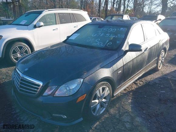 2011 Mercedes-Benz E-Class E 350 Luxury BlueTEC with VIN WDDHF2EB5BA350475, listed as a IAAI auction lot 41777123 with 154,730 mi miles. Bid and sale history available at carsss.com. Image 2.