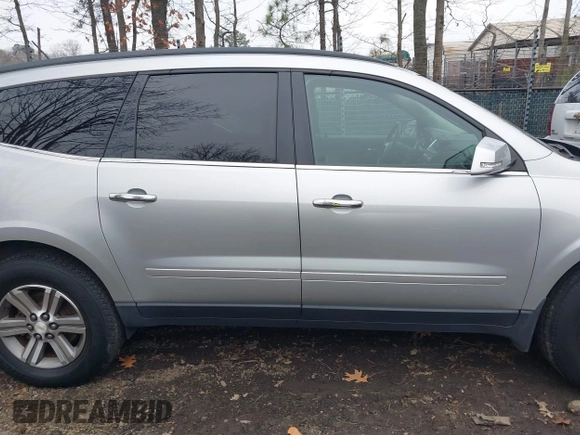 2015 Chevrolet Traverse LT with VIN 1GNKVHKD9FJ122097, listed as a IAAI auction lot 41794833 with 170,314 mi miles and . Bid and sale history available at DreamBid. Image 13.
