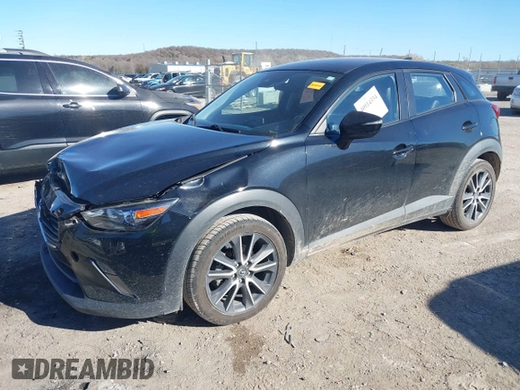 2018 Mazda CX-3 Touring with VIN JM1DKDC70J0325325, listed as a IAAI auction lot 40914334 with 63,978 mi miles. Bid and sale history available at carsss.com. Image 17.