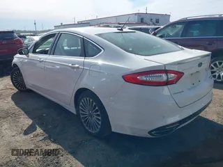 2015 Ford Fusion Titanium with VIN 3FA6P0K90FR207410, listed as a IAAI auction lot 41742534 with 171,008 mi miles. Bid and sale history available at carsss.com. Image 3.