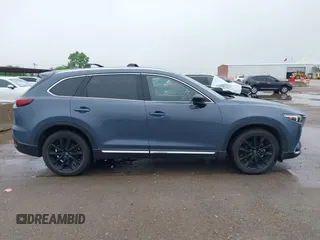 2021 Mazda CX-9 Grand Touring with VIN JM3TCBDY9M0534966, listed as a IAAI auction lot 42166071 with 77,817 mi miles and . Bid and sale history available at DreamBid. Image 13.