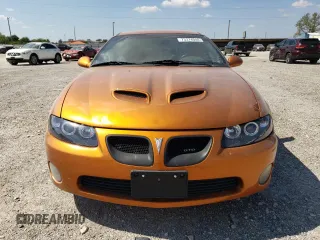 2006 Pontiac GTO with VIN 6G2VX12U76L521089, listed as a Copart auction lot 73374044 with 87,963 mi miles and Salvage Title. Bid and sale history available at carsss.com. Image 5.