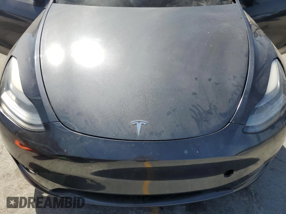 2024 Tesla Model Y Long Range with VIN 7SAYGDEEXRA237667, listed as a Copart auction lot 58260635 with Not provided miles and Salvage title. Bid and sale history available at DreamBid. Image 11.