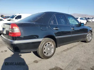 1994 Mercedes-Benz C z VIN WDBHA28E3RF075327, wystawiony jako Copart lot #57819825 z przebiegiem 83 224 mil mil oraz Szkoda całkowita • Salvage title. Historia ofert i sprzedaży dostępna na DreamBid. Obrazek 3.