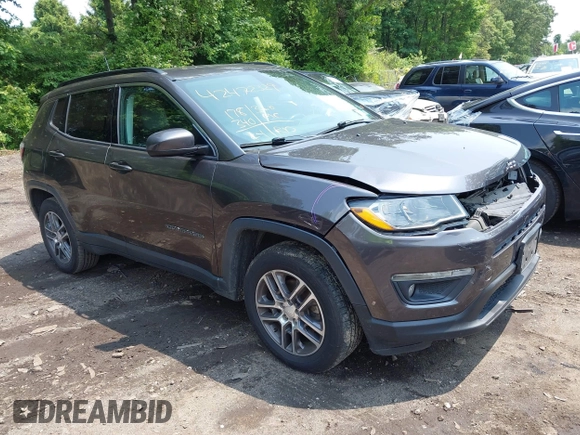 2018 Jeep Compass Latitude z VIN 3C4NJDBB4JT100129, wystawiony jako IAAI lot #42472329 z przebiegiem 178 340 mil mil oraz . Historia ofert i sprzedaży dostępna na DreamBid. Obrazek 1.