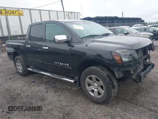 2011 Nissan Titan Pro-4X with VIN 1N6BA0ECXBN319157, listed as a IAAI auction lot 42456725 with 169,434 mi miles and . Bid and sale history available at DreamBid. Image 1.