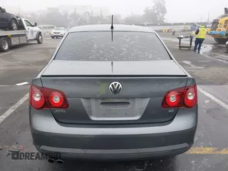 2010 Volkswagen Jetta SE z VIN 3VWRZ7AJ8AM148955, wystawiony jako IAAI lot #41241313 z przebiegiem 134 124 mil mil oraz . Historia ofert i sprzedaży dostępna na DreamBid. Obrazek 16.
