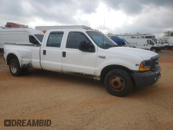 1999 Ford F-350 XL with VIN 1FTWW32FXXEB79284, listed as a Copart auction lot 53969905 with 241,082 mi miles and Salvage title. Bid and sale history available at DreamBid. Image 4.