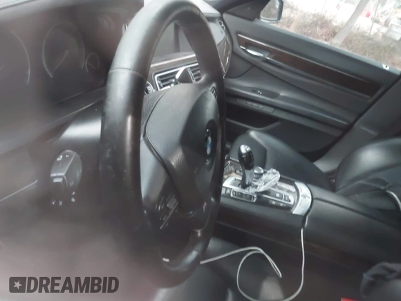 2013 BMW 7 Series 750i xDrive with VIN WBAYB6C59DD223947, listed as a IAAI auction lot 41585255 with Not provided miles and . Bid and sale history available at DreamBid. Image 14.