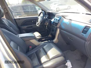 2007 Honda Pilot EX-L z VIN 2HKYF18537H509505, wystawiony jako IAAI lot #42307597 z przebiegiem 223 189 mil mil oraz . Historia ofert i sprzedaży dostępna na DreamBid. Obrazek 5.