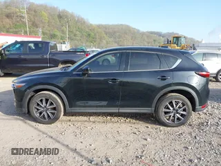 2018 Mazda CX-5 Grand Touring with VIN JM3KFBDM2J0463279, listed as a IAAI auction lot 42115309 with 68,851 mi miles. Bid and sale history available at carsss.com. Image 14.