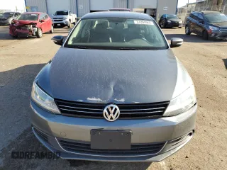2014 Volkswagen Jetta TDI w/Premium z VIN 3VWLL7AJ8EM385667, wystawiony jako Copart lot #57804065 z przebiegiem 122 020 mil mil oraz Szkoda całkowita • Salvage title. Historia ofert i sprzedaży dostępna na DreamBid. Obrazek 5.