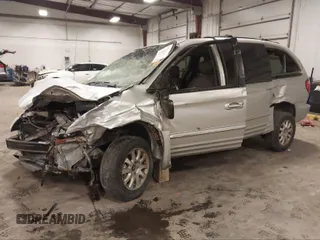 2002 Chrysler Town & Country LXi with VIN 2C4GP54L82R696630, listed as a IAAI auction lot 41730948 with 218,454 mi miles. Bid and sale history available at carsss.com. Image 2.