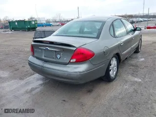2003 Ford Taurus SEL with VIN 1FAFP56S13A124987, listed as a IAAI auction lot 41626121 with 197,237 mi miles. Bid and sale history available at carsss.com. Image 4.