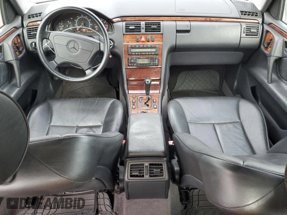 1999 Mercedes-Benz E-Class with VIN WDBJF65H0XA797390, listed as a Copart auction lot 55081405 with 80,950 mi miles and Salvage Title. Bid and sale history available at carsss.com. Image 8.