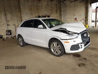2016 Audi Q3 Premium Plus z VIN WA1EFCFS4GR014823, wystawiony jako IAAI lot #42247906 z przebiegiem 137 268 mil mil oraz . Historia ofert i sprzedaży dostępna na DreamBid. Obrazek 1.