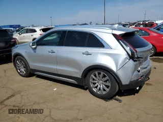 2020 Cadillac XT4 AWD Premium Luxury z VIN 1GYFZDR44LF026447, wystawiony jako Copart lot #53970785 z przebiegiem 118 035 mil mil oraz Szkody całkowita. Historia ofert i sprzedaży dostępna na DreamBid. Obrazek 2.