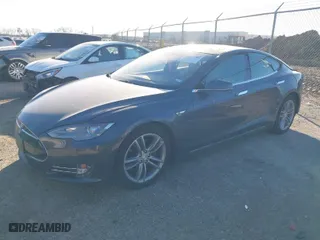 2016 Tesla Model S 90D with VIN 5YJSA1E20GF128496, listed as a IAAI auction lot 41214785 with 126,671 mi miles. Bid and sale history available at carsss.com. Image 2.