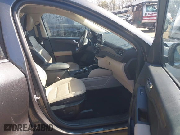 2020 Ford Escape Titanium Hybrid z VIN 1FMCU0DZ7LUB57978, wystawiony jako IAAI lot #41570242 z przebiegiem 32 819 mil mil oraz . Historia ofert i sprzedaży dostępna na DreamBid. Obrazek 5.