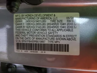 2024 Honda Passport EX-L z VIN 5FNYF8H55RB019867, wystawiony jako Copart lot #50025235 z przebiegiem 17 636 mil mil oraz Czysty tytuł • Clean title. Historia ofert i sprzedaży dostępna na DreamBid. Obrazek 14.