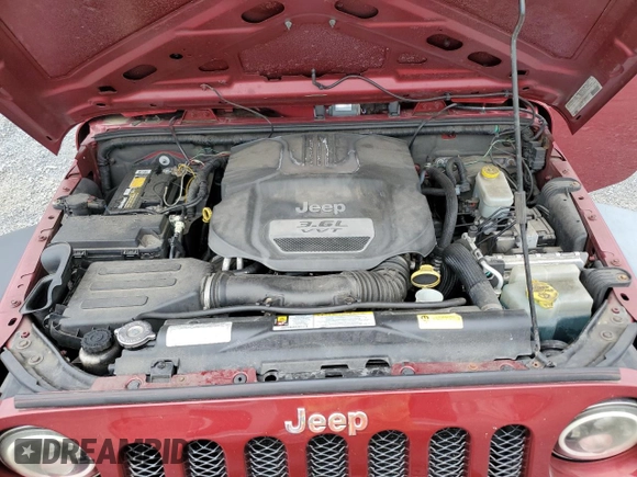 2012 Jeep Wrangler Sport with VIN 1C4AJWAGXCL173771, listed as a Copart auction lot 60336455 with 202,833 mi miles and Clean title. Bid and sale history available at DreamBid. Image 12.