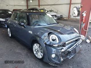 2014 MINI Hardtop S with VIN WMWXM7C50ET731680, listed as a IAAI auction lot 41691317 with 47,205 mi miles and . Bid and sale history available at DreamBid. Image 1.