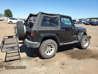 2007 Jeep Wrangler Sahara z VIN 1J4FA54177L183617, wystawiony jako Copart lot #49660785 z przebiegiem 178 846 mil mil oraz Szkoda całkowita • Salvage title. Historia ofert i sprzedaży dostępna na DreamBid. Obrazek 3.