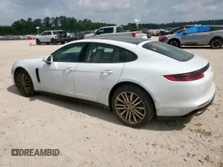 2017 Porsche Panamera с VIN WP0AA2A71HL102183, выставлен на аукционе Copart как лот 57901885 с пробегом 51 605 миль миль и Списание • Salvage title. История ставок и продаж доступна на DreamBid. Изображение 2.