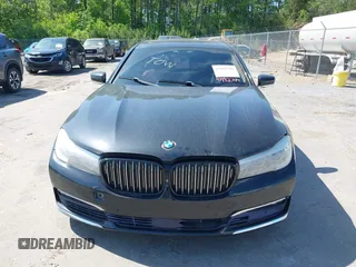 2016 BMW 7 Series 740i with VIN WBA7E2C55GG547752, listed as a IAAI auction lot 41992704 with Not Provided miles and . Bid and sale history available at carsss.com. Image 6.