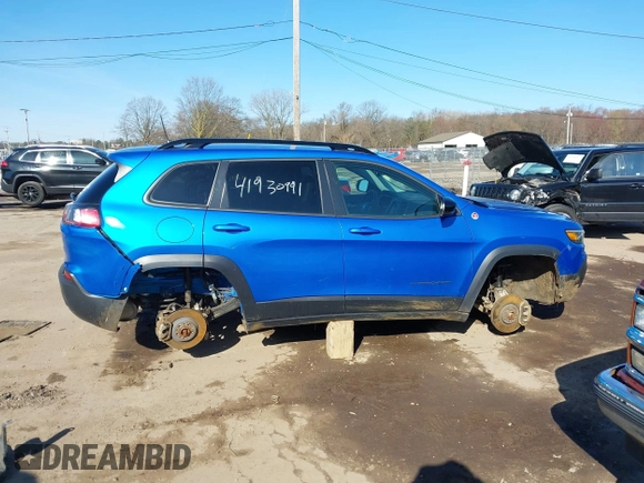 2022 Jeep Cherokee Trailhawk z VIN 1C4PJMBX5ND553336, wystawiony jako IAAI lot #41930991 z przebiegiem 40 832 mil mil oraz . Historia ofert i sprzedaży dostępna na DreamBid. Obrazek 14.