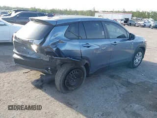 2023 Toyota Corolla Cross L with VIN 7MUAAAAG4PV044969, listed as a IAAI auction lot 42388727 with 26,071 mi miles and . Bid and sale history available at DreamBid. Image 4.