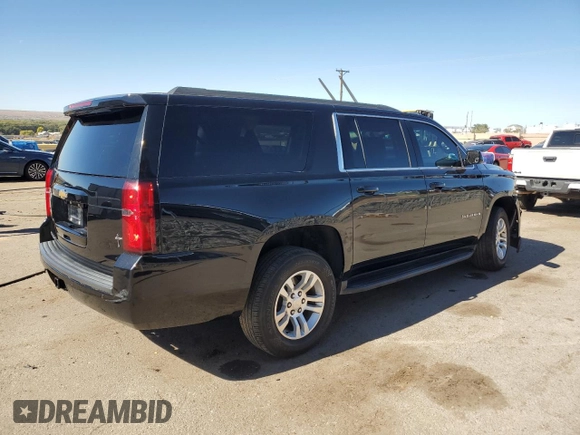2019 Chevrolet Suburban LS with VIN 1GNSCGKC6KR180042, listed as a Copart auction lot 76829394 with 75,574 mi miles and Salvage title. Bid and sale history available at DreamBid. Image 3.