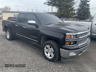 2014 Chevrolet Silverado 1500 LTZ with VIN 1GCVKSEC0EZ265504, listed as a IAAI auction lot 41737186 with 215,850 mi miles and . Bid and sale history available at DreamBid. Image 1.