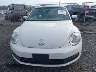 2014 Volkswagen Beetle 2.5L w/Sun with VIN 3VWJP7AT8EM611560, listed as a IAAI auction lot 41488488 with 140,798 mi miles and . Bid and sale history available at DreamBid. Image 13.